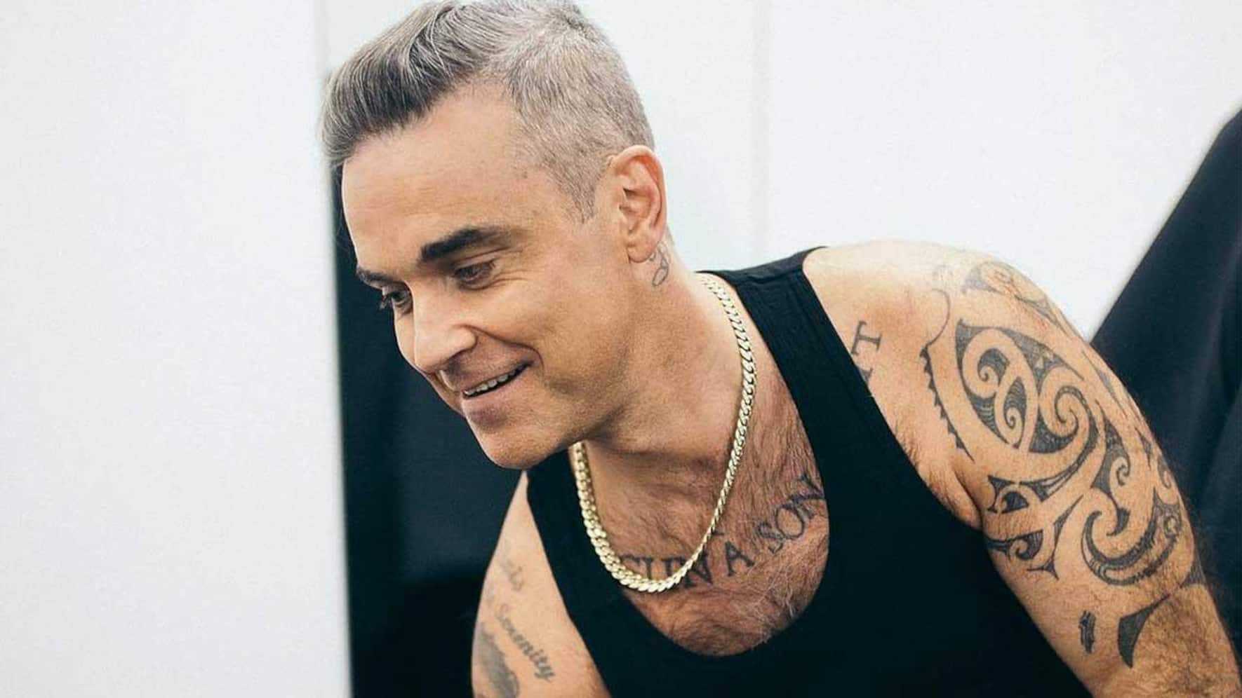 Robbie Williams claims to have slept with over 100 women