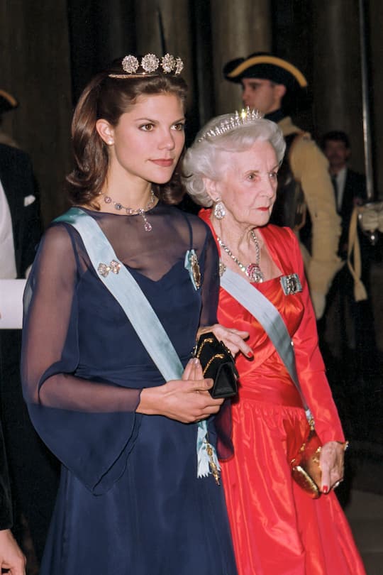 STOCKHOLM, SWEDEN - DECEMBER 2: Crown Princess Victoria of Sweden, and Princess Lillian of Sweden attend a State Banquet at The Royal Palace, Stockholm, during the Russian State visit of President Boris Yeltsin, and his wife Nania, to Sweden, on December 2, 1997, in Stockholm, Sweden. (Photo by Julian Parker/UK Press via Getty Images)
