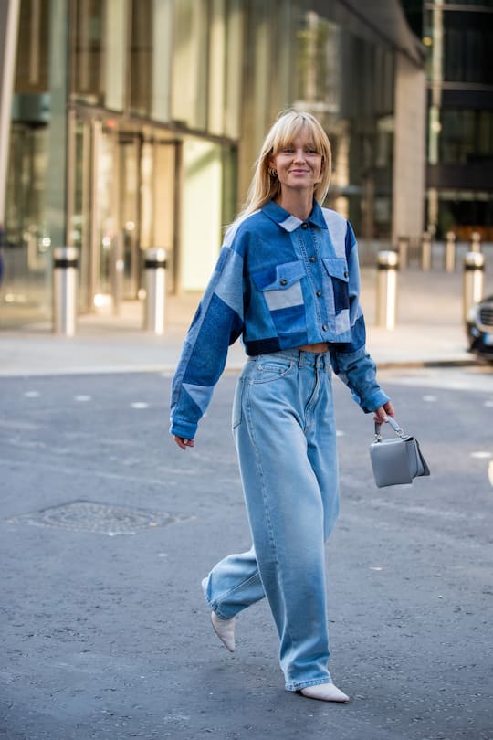 LONDON, ENGLAND - SEPTEMBER 15: Jeanette Friis Madsen is seen wearing denim jeans, checkered cropped jacket outside David Koma during London Fashion Week September 2019 on September 15, 2019 in London, England. (Photo by Christian Vierig/Getty Images)