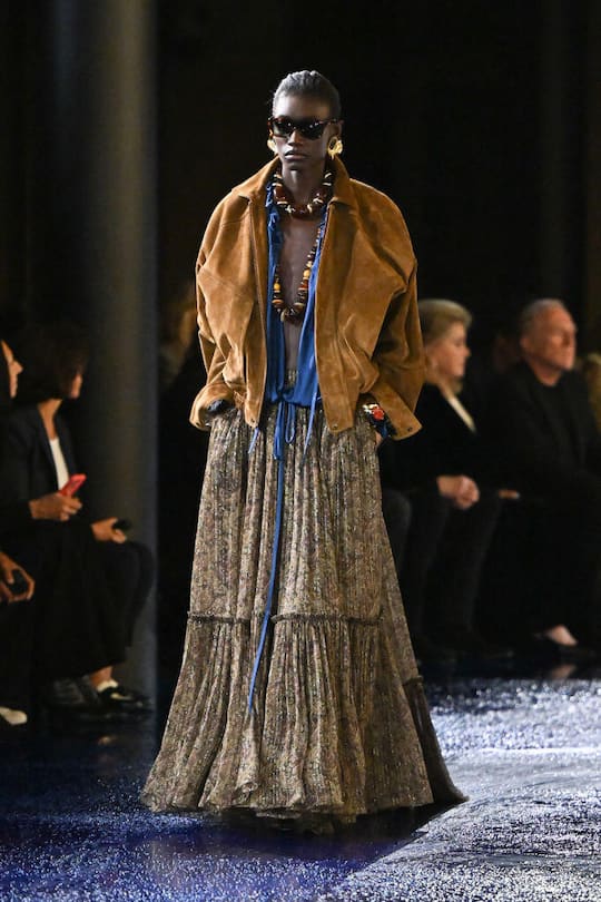 PARIS, FRANCE - SEPTEMBER 24: (EDITORIAL USE ONLY - For Non-Editorial use please seek approval from Fashion House) A model walks the runway during the Saint Laurent Womenswear Spring-Summer 2025 show as part of Paris Fashion Week on September 24, 2024 in Paris, France. (Photo by Stephane Cardinale - Corbis/Corbis via Getty Images)