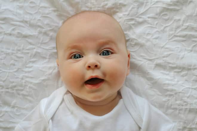 Portrait of a cheerful smiling baby looking at camera