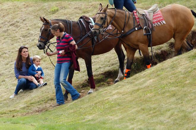 TETBURY, UNITED KINGDOM - JUNE 14: (EMBARGOED FOR PUBLICATION IN UK NEWSPAPERS UNTIL 48 HOURS AFTER CREATE DATE AND TIME) Catherine, Duchess of Cambridge and Prince George of Cambridge attend the Gigaset Charity Polo Match at the Beaufort Polo Club on June 14, 2015 in Tetbury, England. (Photo by Max Mumby/Indigo/Getty Images)