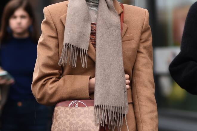 NEW YORK, NEW YORK - FEBRUARY 07: A model is seen wearing a beige coat and Chanel purse outside the Maryam Nassir Zadeh show during New York Fashion Week: Women's Fall/Winter 2019 on February 07, 2019 in New York City. (Photo by Daniel Zuchnik/Getty Images)
