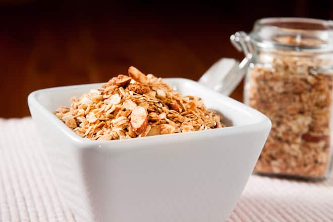 A bowl of Honey Almond Granola with Shredded Coconut.