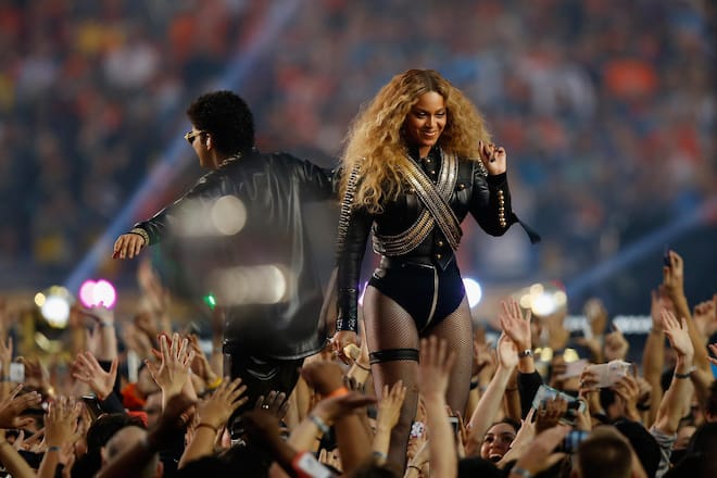 SANTA CLARA, CA - FEBRUARY 07: Beyonce and Bruno Mars perform during the Pepsi Super Bowl 50 Halftime Show at Levi's Stadium on February 7, 2016 in Santa Clara, California. (Photo by Ezra Shaw/Getty Images)