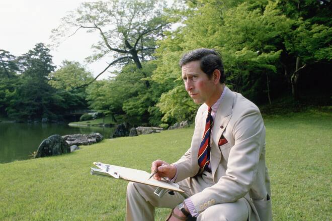 JAPAN - MAY 08: Prince Charles sketching in the gardens of Omiya Palace during a break in his official tour of Japan. (Photo by Tim Graham Photo Library via Getty Images)