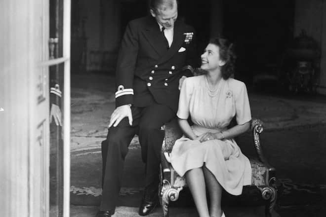 Princess Elizabeth (later Queen Elizabeth II) and her fiance, Philip Mountbatten at Buckingham Palace, after their engagement was announced, 10th July 1947. (Photo by Topical Press Agency/Hulton Archive/Getty Images)
