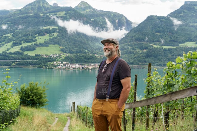 GRUEN 03/21 Walensee Quinten, Switzerland - July 1, 2021. Neo-Weinbauer und Kulturveranstalter Hanspeter Cadonau July 1, 2021 in Quinten. Hanspeter Cadonau führt das Vinicultura und Veranstalter Slam Poetry events in Quinten. CREDIT: Flurina Rothenberger for Die Zeit.