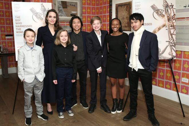 NEW YORK, NEW YORK - FEBRUARY 25: Angelina Jolie with children Knox Leon Jolie-Pitt, Vivienne Marcheline Jolie-Pitt, Pax Thien Jolie-Pitt, Shiloh Nouvel Jolie-Pitt, Zahara Marley Jolie-Pitt and Maddox Chivan Jolie-Pitt attend "The Boy Who Harnessed The Wind" Special Screening at Crosby Street Hotel on February 25, 2019 in New York City. (Photo by Monica Schipper/Getty Images for Netflix)